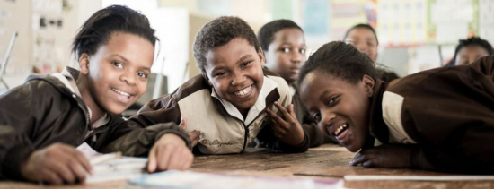 Children at Beautiful Gate smiling