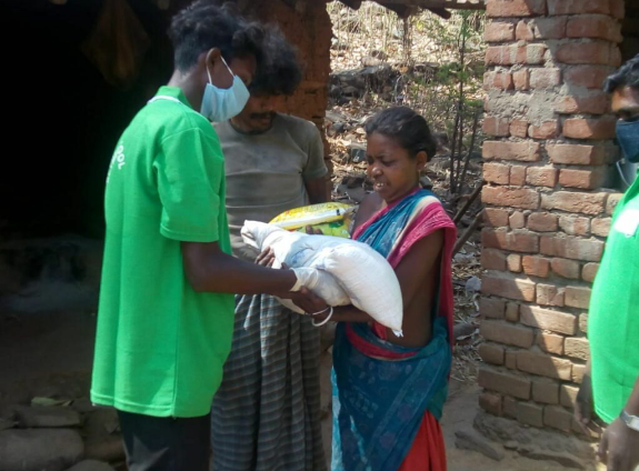 woman receives food rations