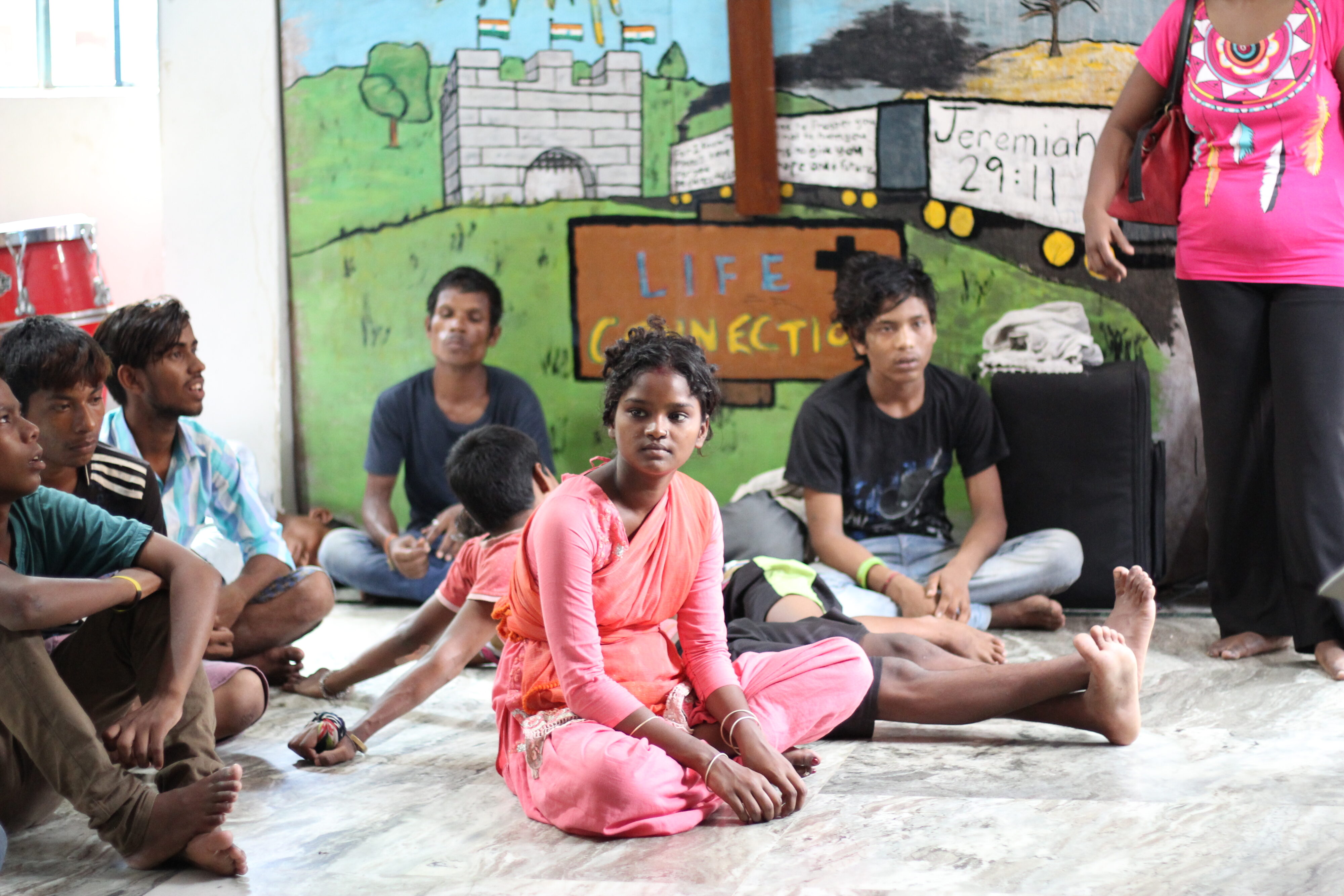 children sitting at day center calcutta