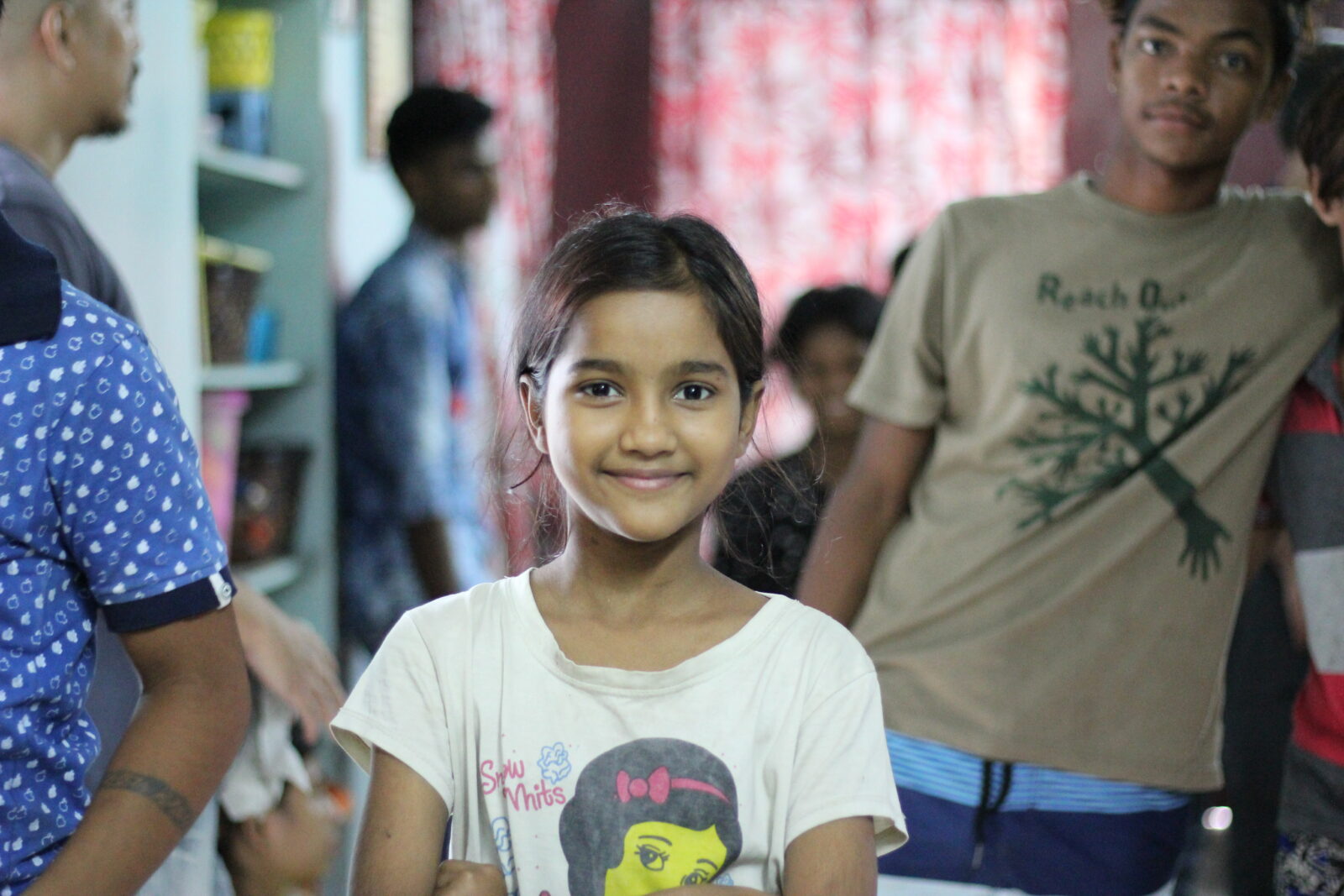 girl at day center smiling calcutta