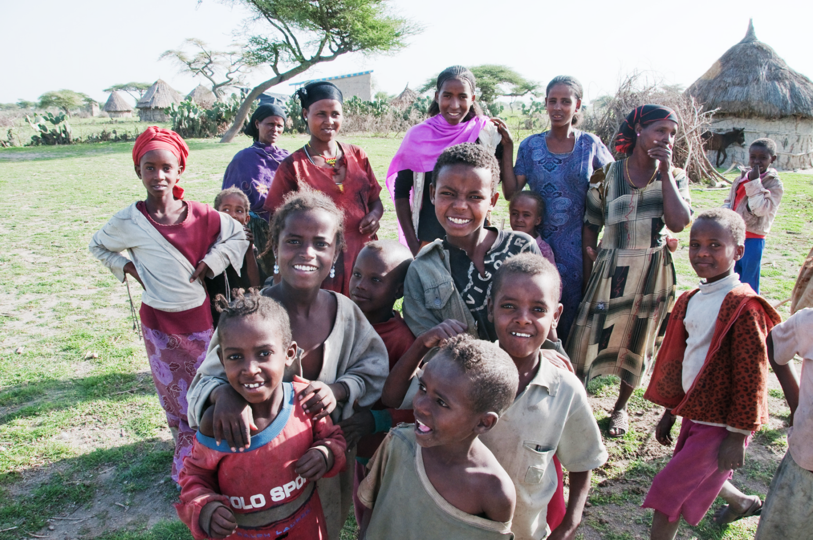 poor children in Uganda smiling