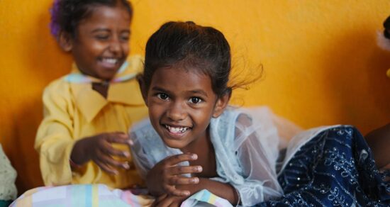 Irula girl smiling while at the Irula Children's Center transforming vulnerable children through education
