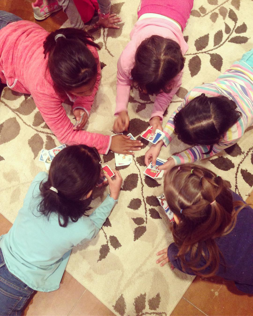 children from Rancho Los Amigos playing UNO