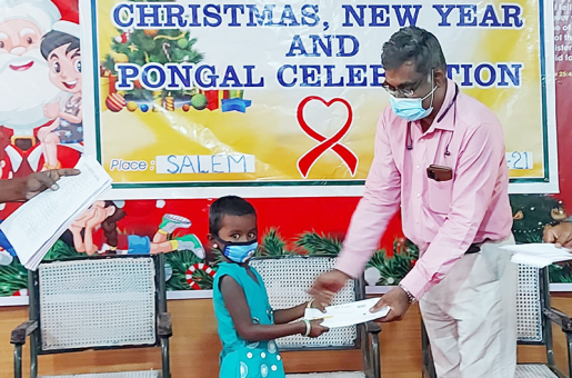 A young girl receiving her voucher to purchase her own clothes!